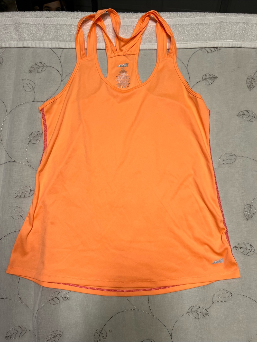 Reebok Women’s Orange Performance Racerback Tank 62.5